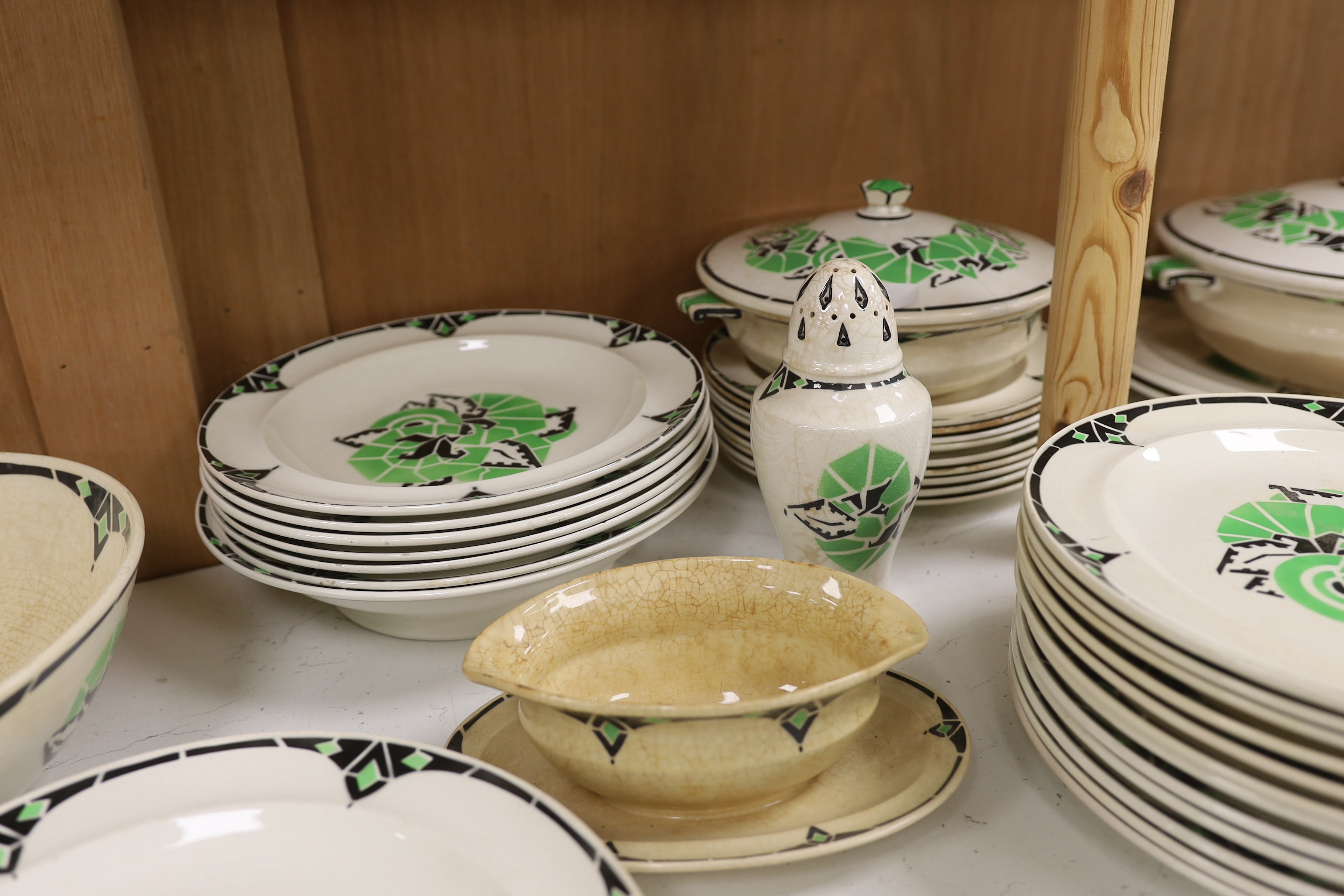 A Rouard Art Deco part dinner service including tureens, soup bowls and a centre bowl